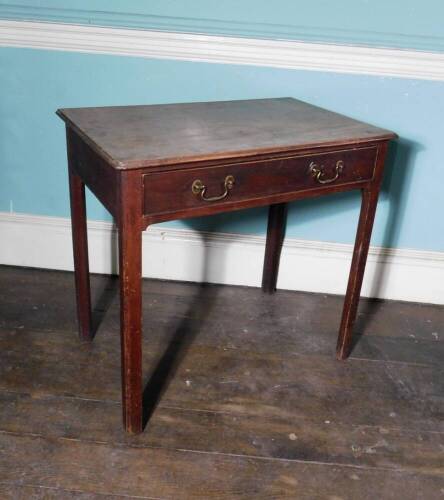 A George III mahogany side table, the top with a moulded edge above a frieze drawer on chamfered legs, 73cm high, 77cm wide, 49cm deep.