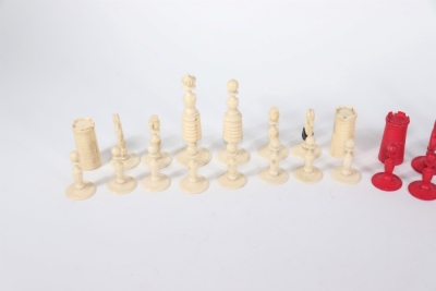 A Victorian carved and turned bone chess set, 9cm King height, in a mahogany box with sliding lid. - 2