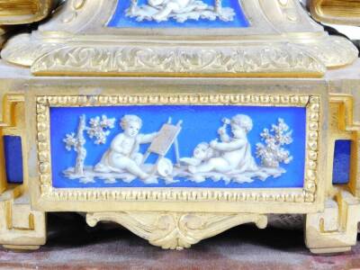 A 19thC French ormolu and Paris porcelain figural mantel clock, with enamel dial marked Howell & James, Paris, signed on the back plate and numbered 680, on a contemporary gilt wood stand, the clock being 29cm high, 39cm wide. - 3