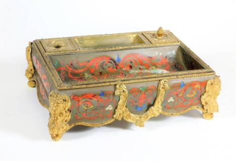 A 19thC French Boulle work encrier desk stand, with ormolu swag mounts and bacchanalian mask head scrolling feet, lacking one ink receiver and one cover finial, 25cm x 17cm x 10cm. (AF)