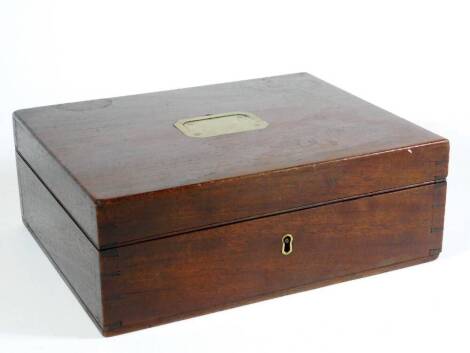 A George III mahogany rectangular cutlery box, with inset brass handle to the hinged lid, with fitted interior and removable tray to house dessert knives, spoons and forks, the inner lid bears a paper label for Hamlet, Goldsmiths and Jewellers to His Maje