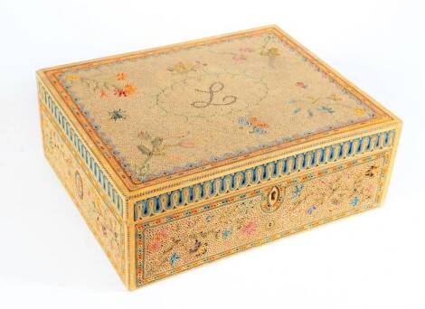 A Regency rolled paper scroll workbox, the hinged lid and sides decorated with sprigs of flowers, insects and butterflies, the lid bearing initial 'L' (for Little), the interior with a pink paper lining, and the contents to include a pin cushion and threa