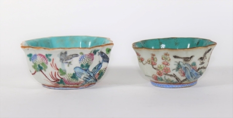 Two similar 19thC Chinese porcelain bowls, with turquoise interior painted with birds, berries and blossom, seal mark to base, 11cm and 9cm diameter. (2)