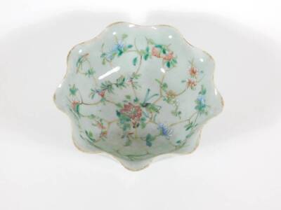 A 19thC celadon glazed Chinese porcelain bowl enamelled with peony branches, with wavy edge and six character Tongzhi seal mark to base and probably of the period (1862 - 1874), 17cm diameter. - 2