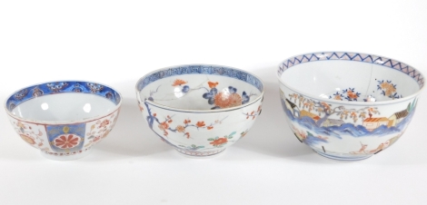 Two 18thC Japanese Imari porcelain bowls, and another Chinese bowl with panelled decoration, 19cm down. (all AF)