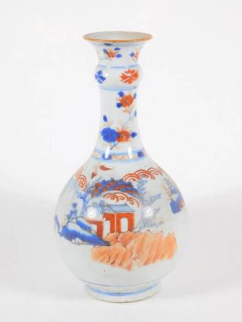 An 18thC Chinese porcelain bottle vase, decorated with buildings and landscapes, 26cm high.