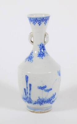 A 19thC Japanese Seto blue and white porcelain bottle vase, with tapering neck with handles and decorated with flowers and foliage, 19cm high. - 2