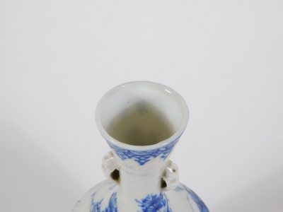 A 19thC Japanese Seto blue and white porcelain bottle vase, with tapering neck with handles and decorated with flowers and foliage, 19cm high. - 3