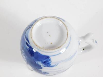 An early 19thC Chinese blue and white porcelain milk jug, with loop handle and sparrow beak spout, 11cm high. - 4