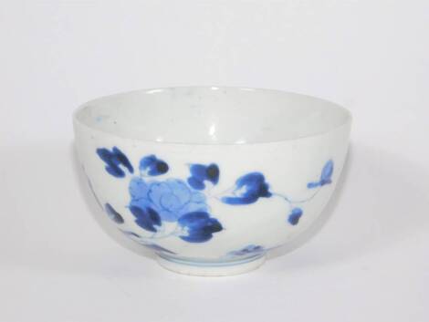 A 19thC Chinese blue and white porcelain bowl, decorated with flowers, six character mark to base, 11cm diameter.