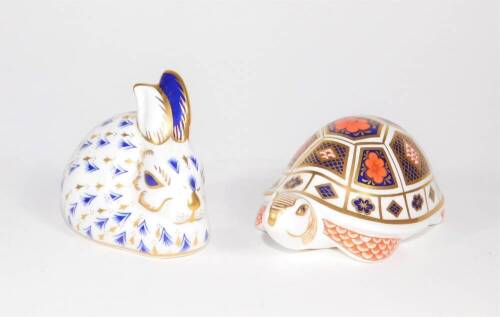 Two Royal Crown Derby paperweights, comprising of a rabbit and tortoise.