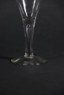 An 18thC wine glass, with trumpet bowl and tapered air stem, 16.5cm high. - 2