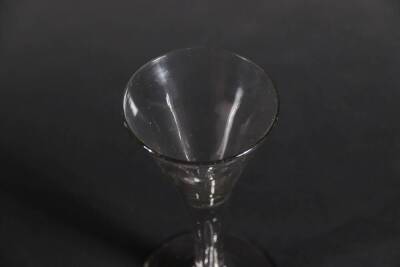 An 18thC wine glass, with trumpet bowl and tapered air stem, 16.9cm high. - 3