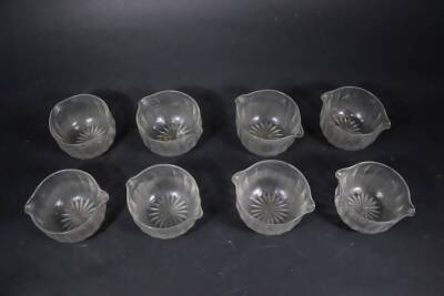 A set of eight early 19thC glass rinser bowls, with slice cut decoration and star cut bases, 12cm diameter. - 2