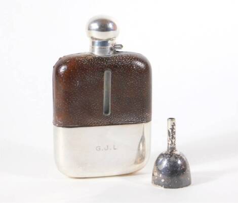 A George IV leather bound glass hip flask (3/8 pint), with silver bayonet cap and cup, initialled GJL, Sheffield 1926, makers: James Dixon & Sons, for Page Keen and Page Plymouth, and a silver plated funnel. (2)