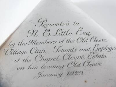 An Edwardian silver table cigarette box, of plain slightly domed rectangular design with hinged lid inscribed 'Presented to N E Little Esq by Members of Old Cleave Village Club...January 1929', London 1905, 18cm x 16cm x 4cm. - 2