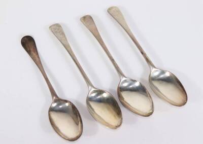 A set of three George III crested silver tablespoons, with Old English pattern handles, London 1767, makers marks indistinct, and another 18thC tablespoon, initialled 'L', marks indistinct (4), 7.5oz.