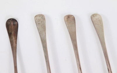 A set of three George III crested silver tablespoons, with Old English pattern handles, London 1767, makers marks indistinct, and another 18thC tablespoon, initialled 'L', marks indistinct (4), 7.5oz. - 2
