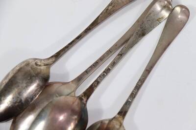 A set of three George III crested silver tablespoons, with Old English pattern handles, London 1767, makers marks indistinct, and another 18thC tablespoon, initialled 'L', marks indistinct (4), 7.5oz. - 3