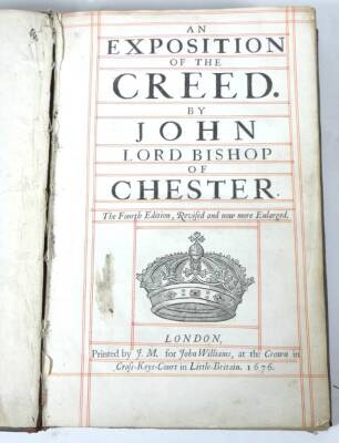 John (Chester, Lord Bishop) AN EXPOSITION OF THE CREED... fourth edition, woodcut title vignette and historiated initials, title ruled in red and black, contemporary panelled calf, large tear to top board, folio, J. M., 1676. - 2