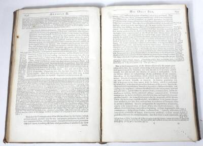 John (Chester, Lord Bishop) AN EXPOSITION OF THE CREED... fourth edition, woodcut title vignette and historiated initials, title ruled in red and black, contemporary panelled calf, large tear to top board, folio, J. M., 1676. - 4