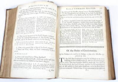 Clarke (Laurence) A COMPLEAT EXPOSITION OF THE BOOK OF COMMON-PRAYER... engraved frontispiece and plates, title in red and black, contemporary sprinkled calf, morocco spine label, 4to, for the author, 1737. - 4