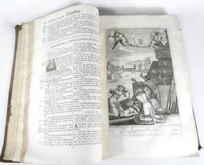 Bible in English.- THE HOLY BIBLE CONTAINING THE OLD TESTAMENT AND THE NEW woodcut tittle vignettes, engraved plates throughout, contemporary reversed calf, tooled in blind, worn with one board lacking, large folio, C. Bill, 1701. - 5