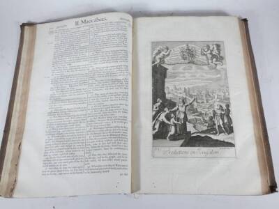 Bible in English.- THE HOLY BIBLE CONTAINING THE OLD TESTAMENT AND THE NEW woodcut tittle vignettes, engraved plates throughout, contemporary reversed calf, tooled in blind, worn with one board lacking, large folio, C. Bill, 1701. - 9