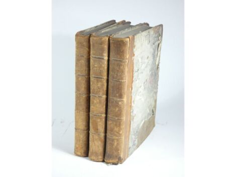 [Catton (Charles)] THE ENGLISH PEERAGE 3 vol., frontispieces, engraved plates, tissue guards, contemporary half calf over patterned boards, worn, large 4to, T. Spilsbury, 1790.