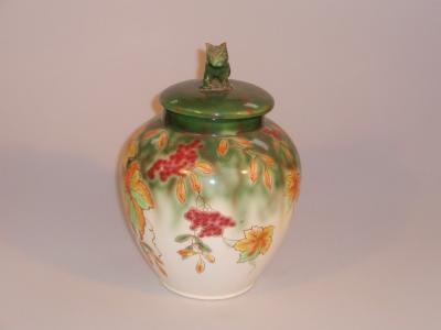 An early 20thC SylvaC floral pattern pottery vase and cover