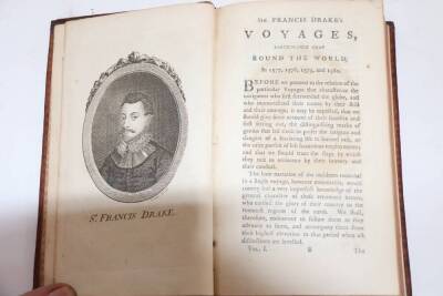 .- AN HISTORICAL ACCOUNT OF ALL THE VOYAGES AROUND THE WORLD 4 vol., engraved maps and plates, contemporary speckled calf, 8vo, F. Newberry, 1774. - 2