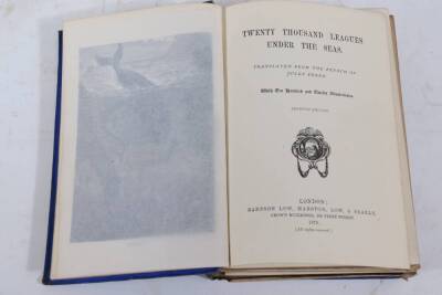 Verne (Jules) DROPPED FROM THE CLOUDS; .- FROM THEEARTH TO THE MOON; .- FIVE WEEKS IN A BALLOON; .- TWENTY THOUSAND LEAGUES UNDER THE SEA, 1875, publisher's pictorial cloth, 8vo. - 3