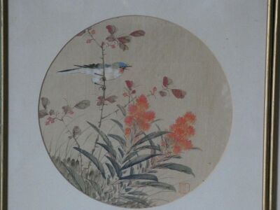 A pair of 20thC Chinese paintings on silk, depicting birds within flowering foliage and shrubs, 23.5cm diameter. - 2