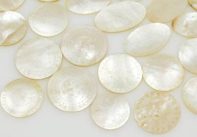 A collection of 19thC mother of pearl gaming counters, of circular and oval design, mainly engraved, (65). - 4