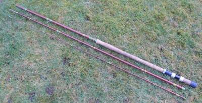 A three piece double handed fly rod, "The Wye" by W H Norris of Leamington Spa, twelve foot six inches, #9, with bag.