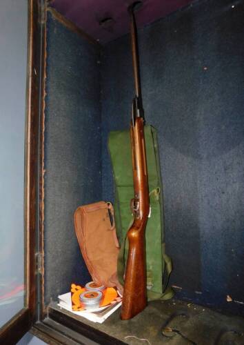 A Gecado (Germany). Model .27 air rifle, with break barrel action and two gun slip cases, and a selection of pellets, targets, etc.