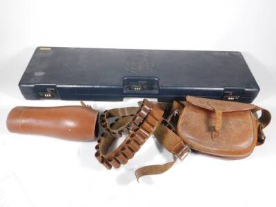 A leather cartridge bag by Payne Galwey, a leather cartridge belt and a pair of leather gaiters, a Beretta gun case, with three combination locks.
