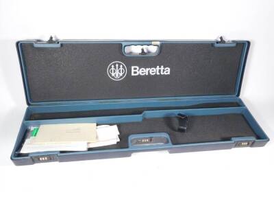 A leather cartridge bag by Payne Galwey, a leather cartridge belt and a pair of leather gaiters, a Beretta gun case, with three combination locks. - 3