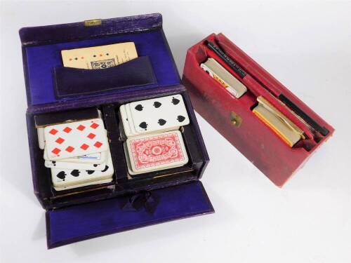 A vintage Poker and Patients purple Morocco leather card case, and piquet red Morocco leather card game case with contents. (2)