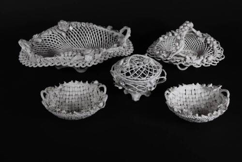 A group of white porcelain basket wares, some with S&H Derby marks, the size of the largest dish is 28cm over handles, the pair 13cm, the basket 17cm and the nest box 10cm. (5)