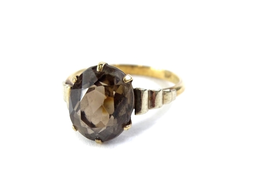 A Smoky quartz dress ring, set in 9ct gold, 2.9g all in.