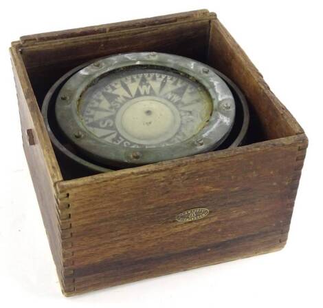 An I C and W Lord Limited brass compass, in original box (AF), 22.5cm wide.