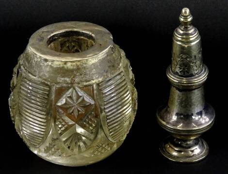 A 20thC etched glass match strike, with white metal mount, 6cm high, (AF), and a silver plated lidded urn shaped pepper pot, 8cm high. (2)