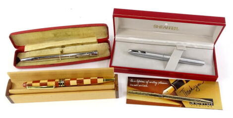 A Sheaffer 444 medium brushed steel fountain pen, and other pens, etc.