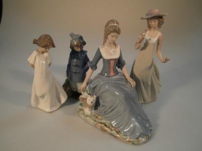Four Nao porcelain figures. A young girl in a winter coat