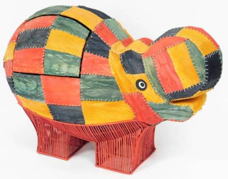 A multi coloured hide, wicker and metal framed hippo storage box, 79cm high, 106cm wide, 37cm deep approx.