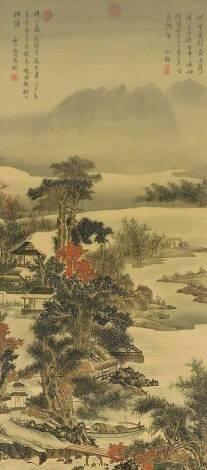 An Oriental painting of a lakeside scene, with bridge in front of pavillions, trees and hills, ink and coloured wash, signed and inscribed with calligraphy and seal marks, 127cm x 56cm.