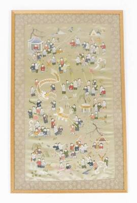 A Chinese silk embroidery, with a multitude of figures performing a dragon dance and celebrating with symbols, kites, lanterns, etc., 69cm x 41cm, framed and glazed. - 2