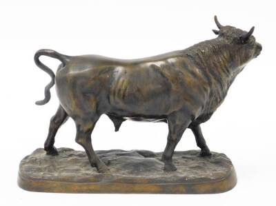 A 20thC bronze figure of a standing bull, on a rustic base, 24.5cm high. - 3