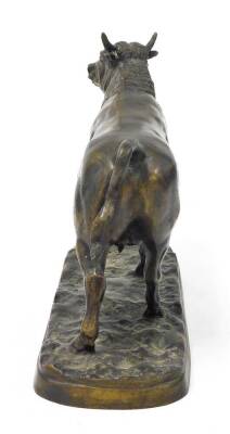 A 20thC bronze figure of a standing bull, on a rustic base, 24.5cm high. - 4